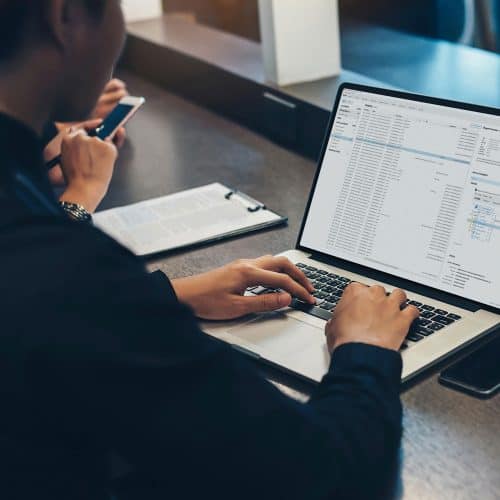 Person typing on computer